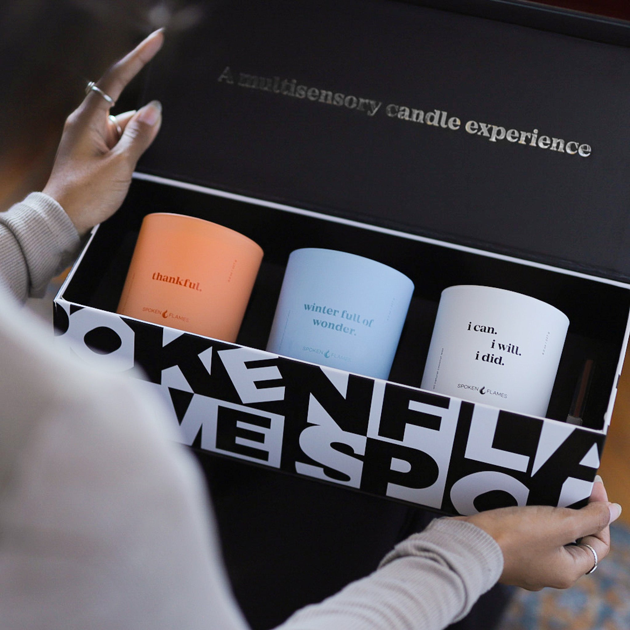 Woman holding Fall Winter Candle Set open